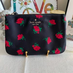 Kate Spade medium rose toss wrist pouch. NWT 8”x5.5”$25